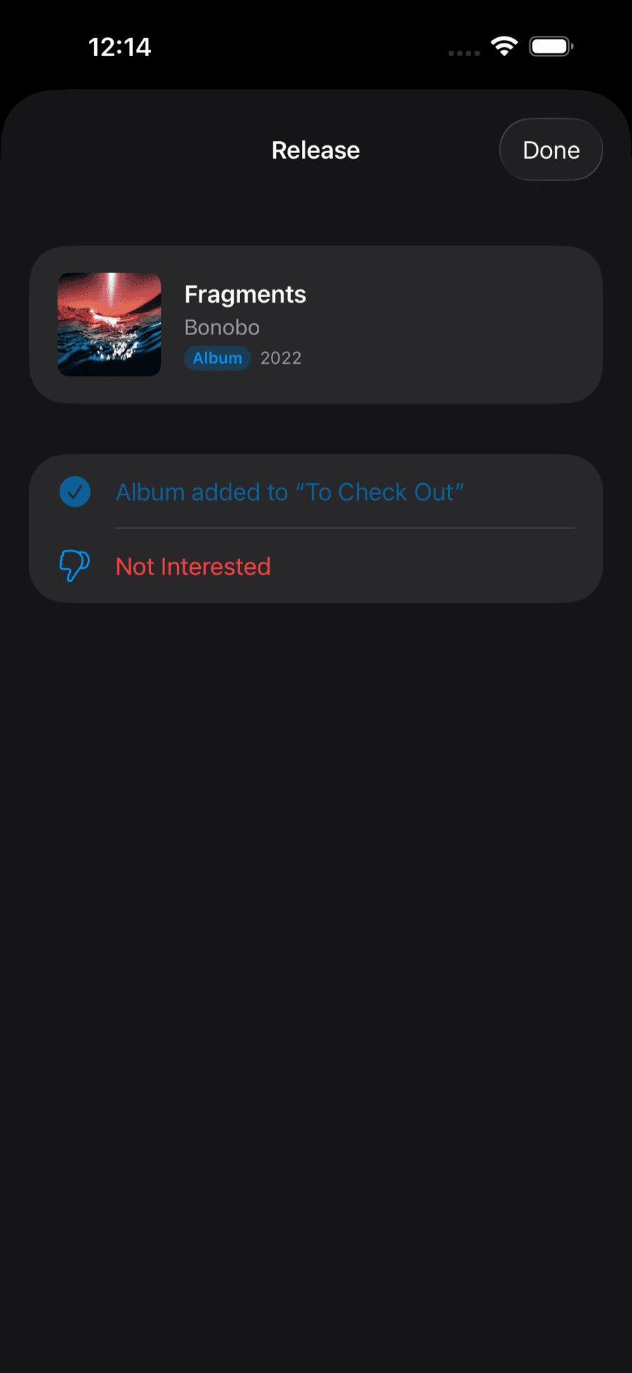 A confirmation screen showing an album added to the "To Check Out" playlist, with a Not Interested option below it.